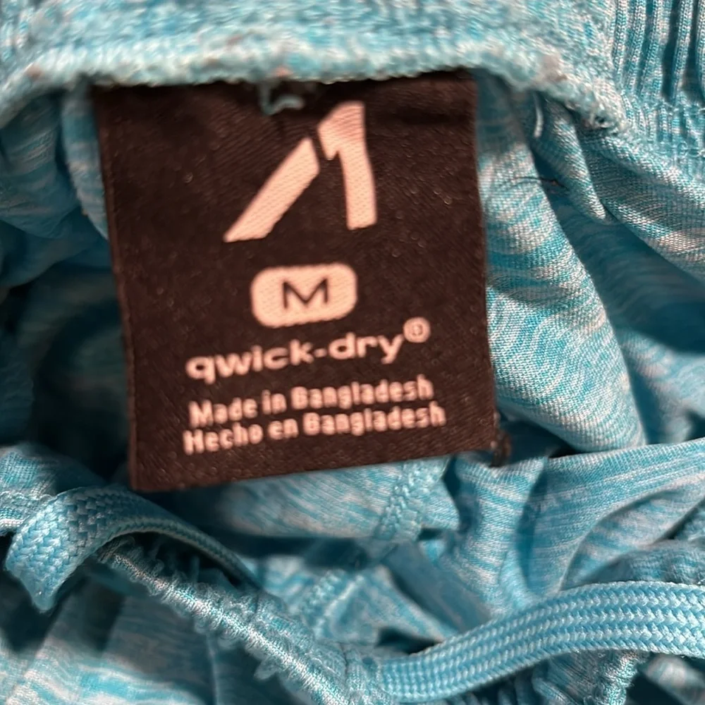 Boys quick dry mesh athletic shorts light blue and dark blue. Ties at waist
